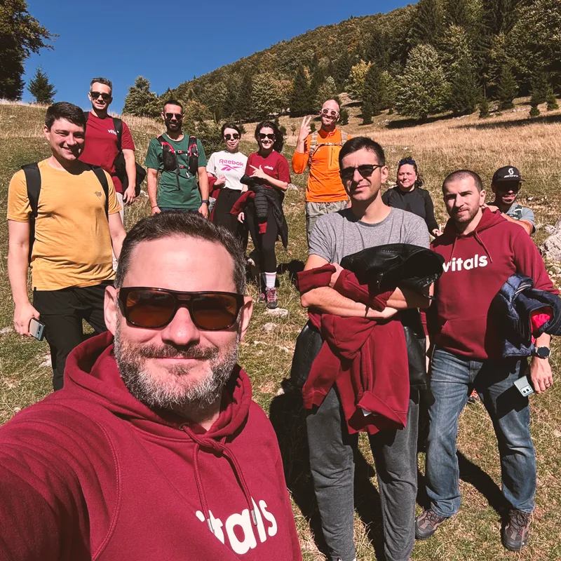 A group selfie on a mountain hike