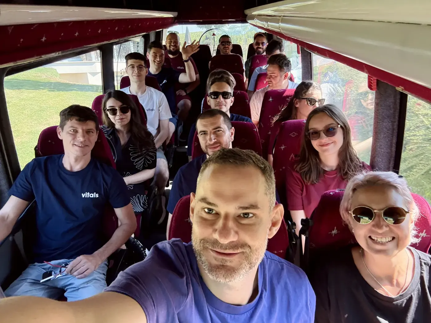 Teammates on a bus during a team trip