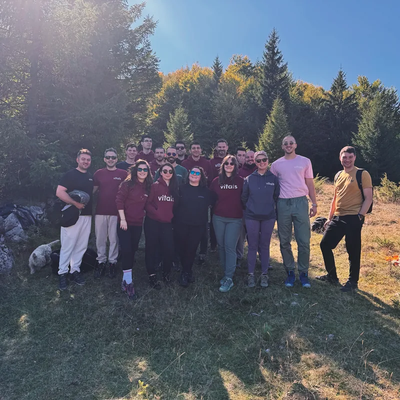 The team in a forest clearing