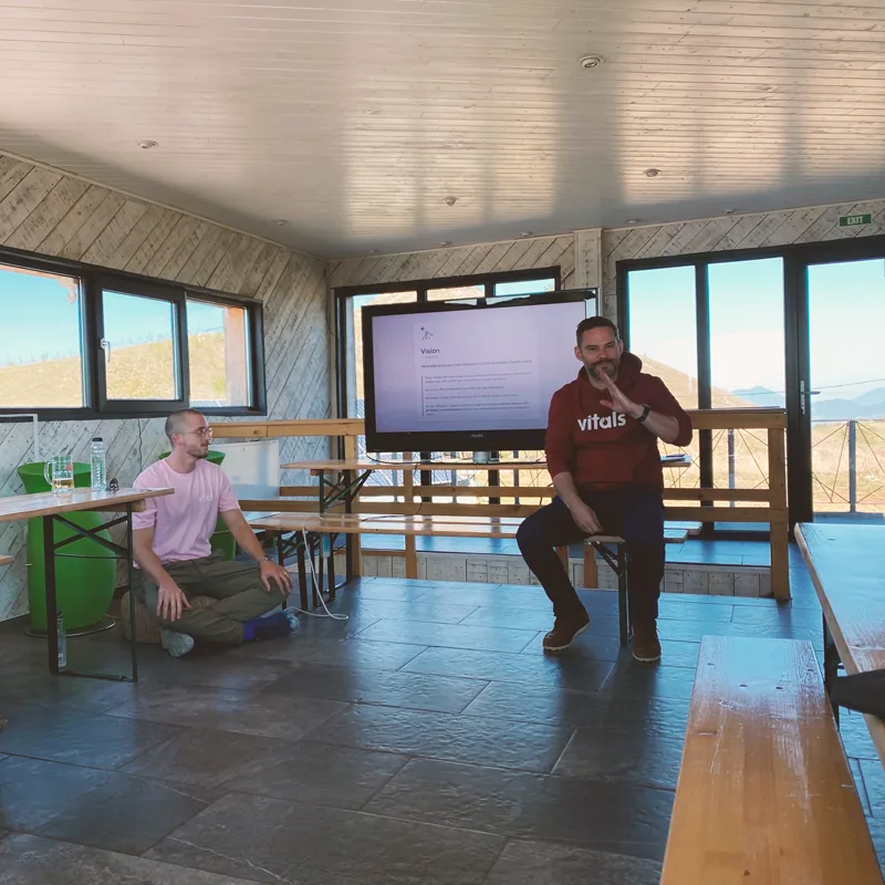 A teammate presenting at a team workshop